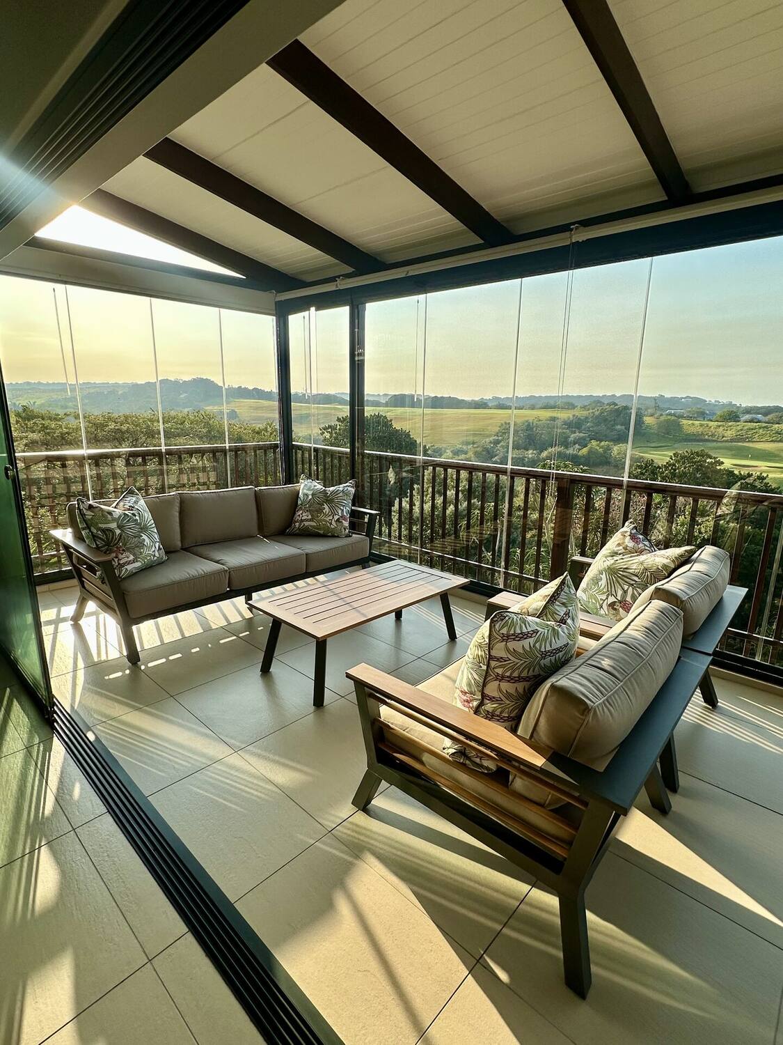 Panoramic view from the Fairway Views veranda overlooking the golf course