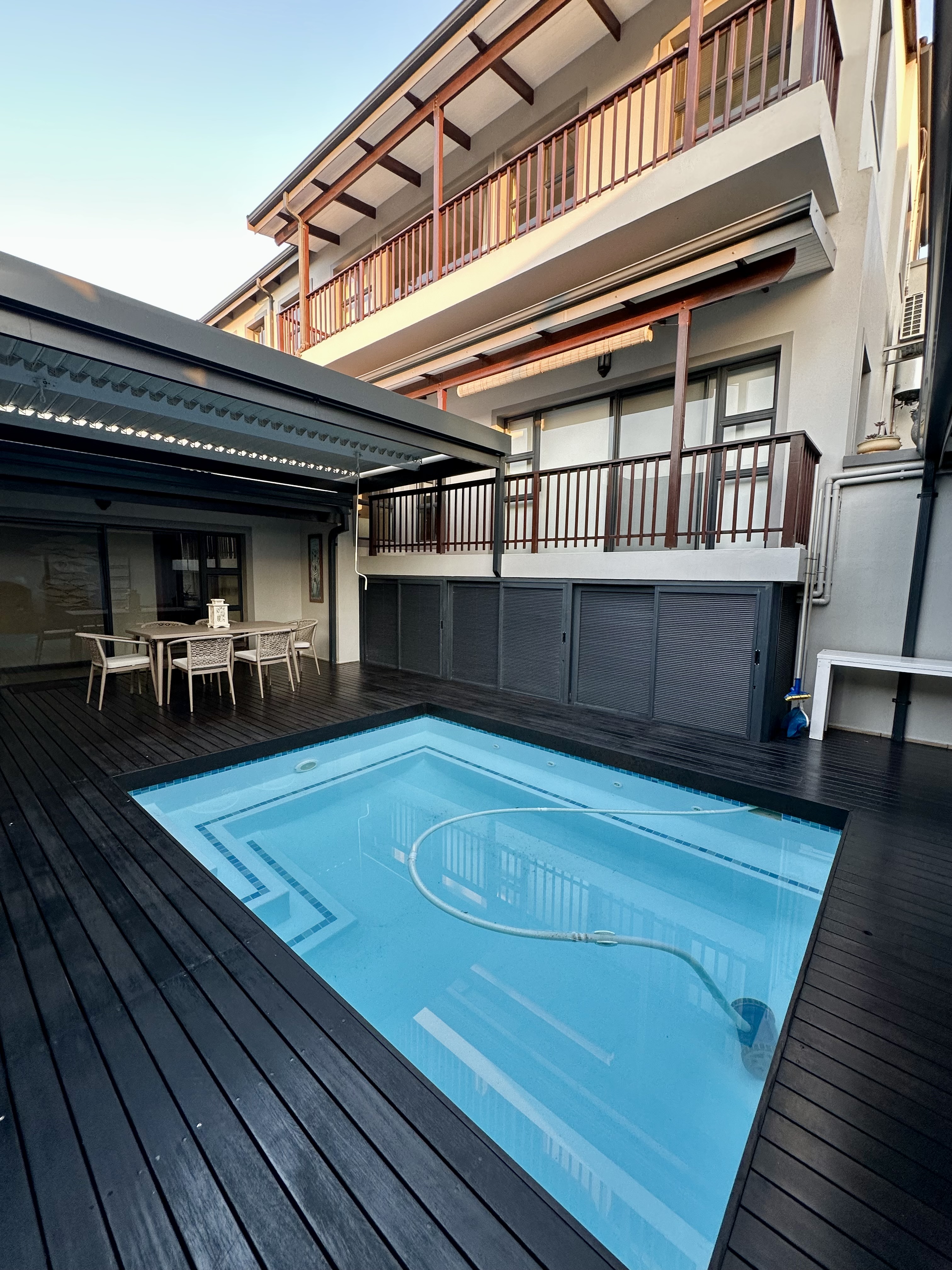 Courtyard pool with surrounding deck