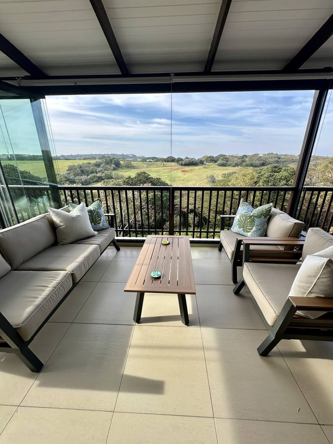 Veranda lounge seating with fairway views
